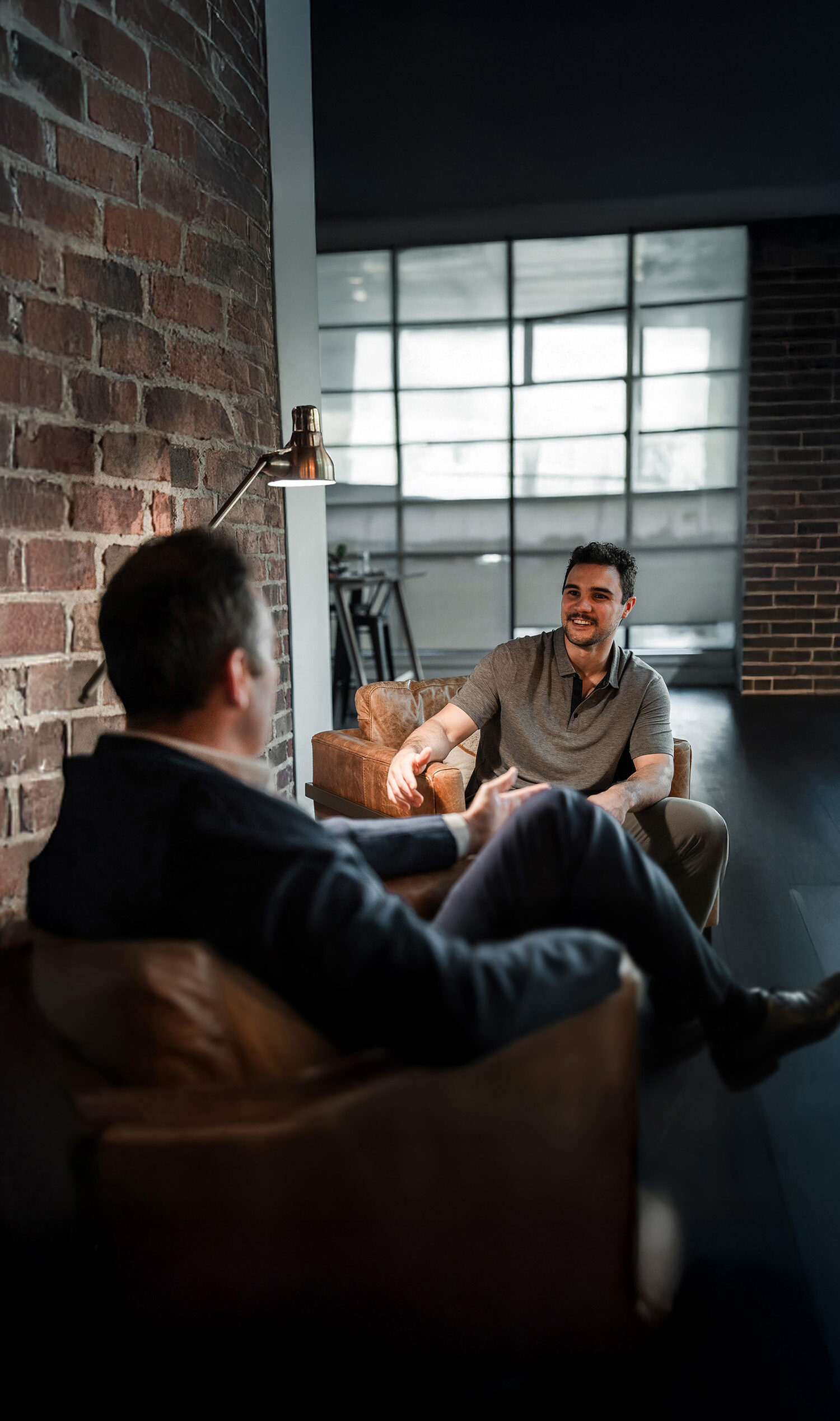 Holden in a conversation with a client
